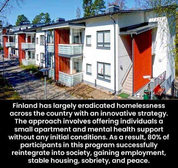 This meme is a photo of a row of identical, drab, and uninviting apartment buildings. The text accompanying the image reads: "In Finland, 99% of homeless people get permanent housing, most of them apartments, and they get to keep them. 80% of former addicts get sober and stay sober. 90% of former prisoners don't go back to prison. Finland has basically eliminated homelessness, poverty, addiction, and crime. What are you doing differently?"